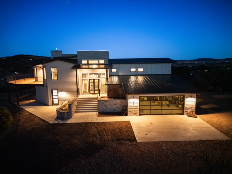 The front entrance of 2111 Vantage Circle is lit at night