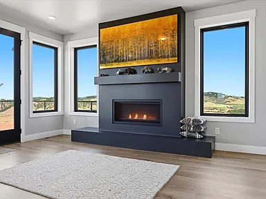 Fireplace with the aspen print above