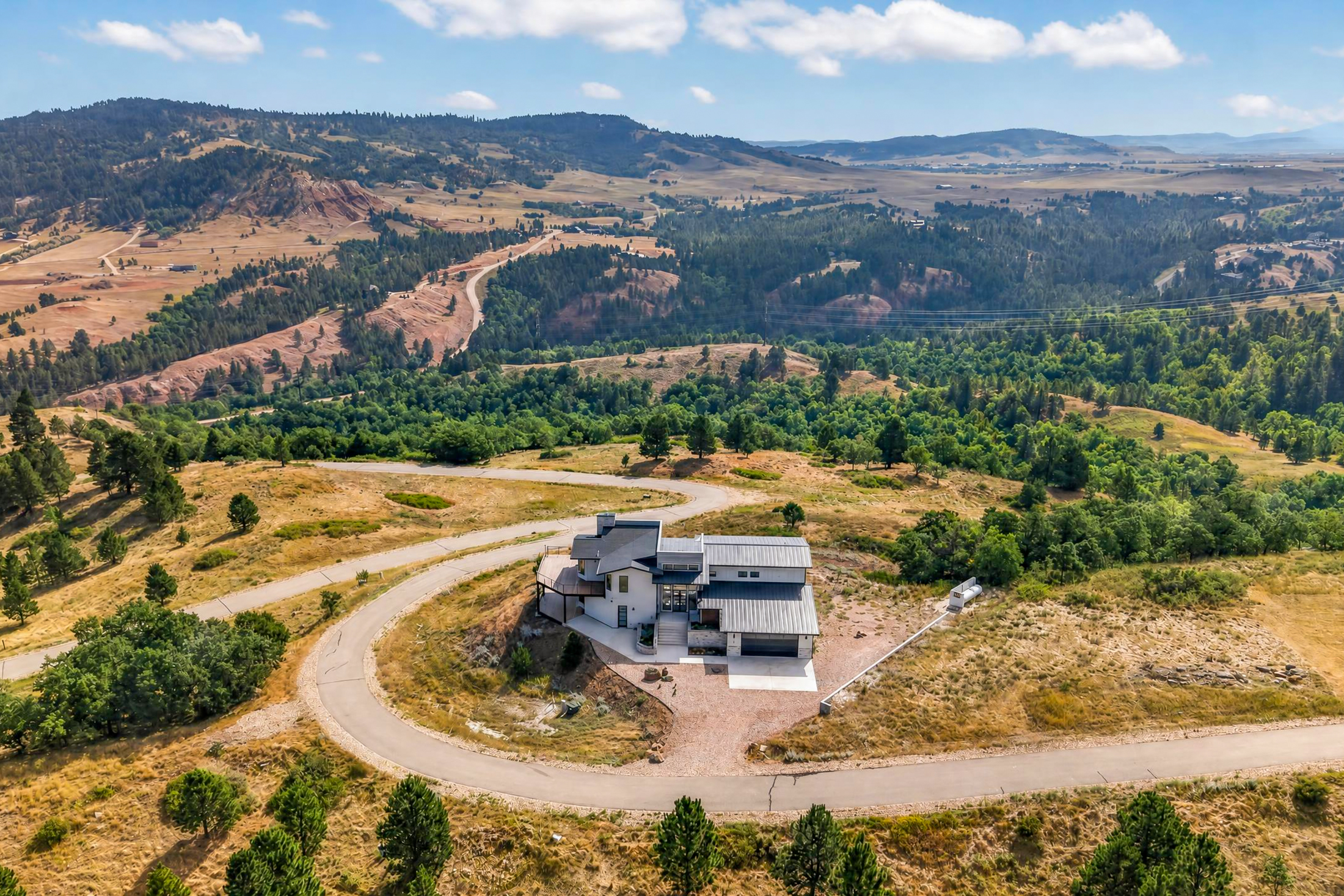 2111 Vantage Circle is seen from the air beside its curving access road