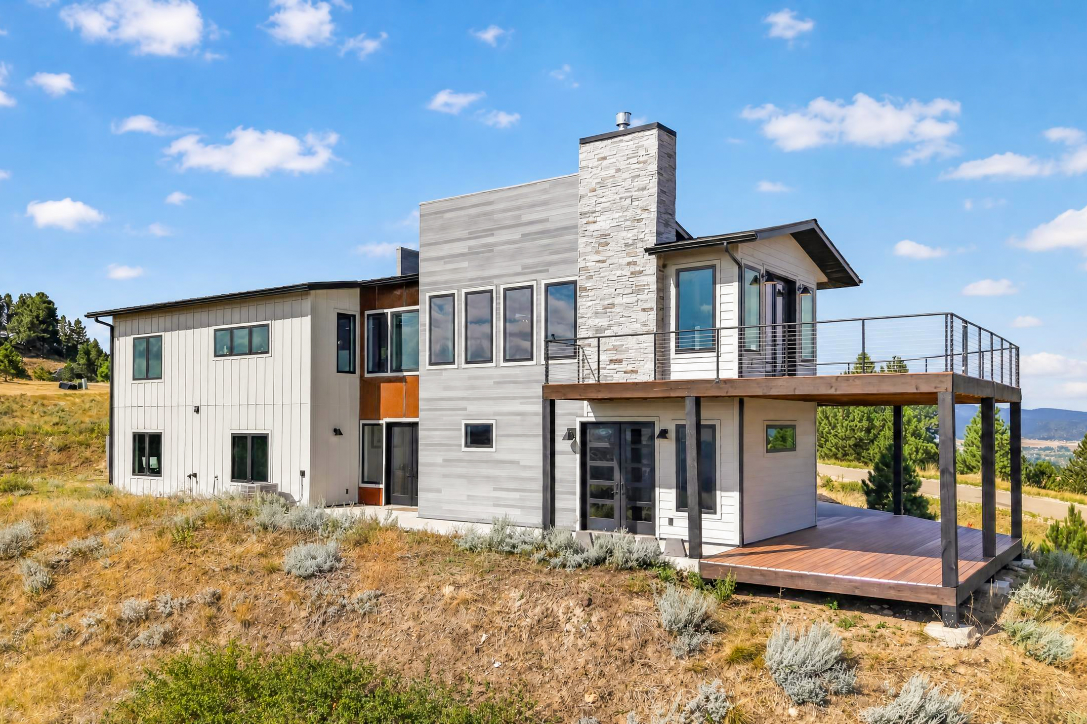 2111 Vantage Circle's rear facade combines board siding
